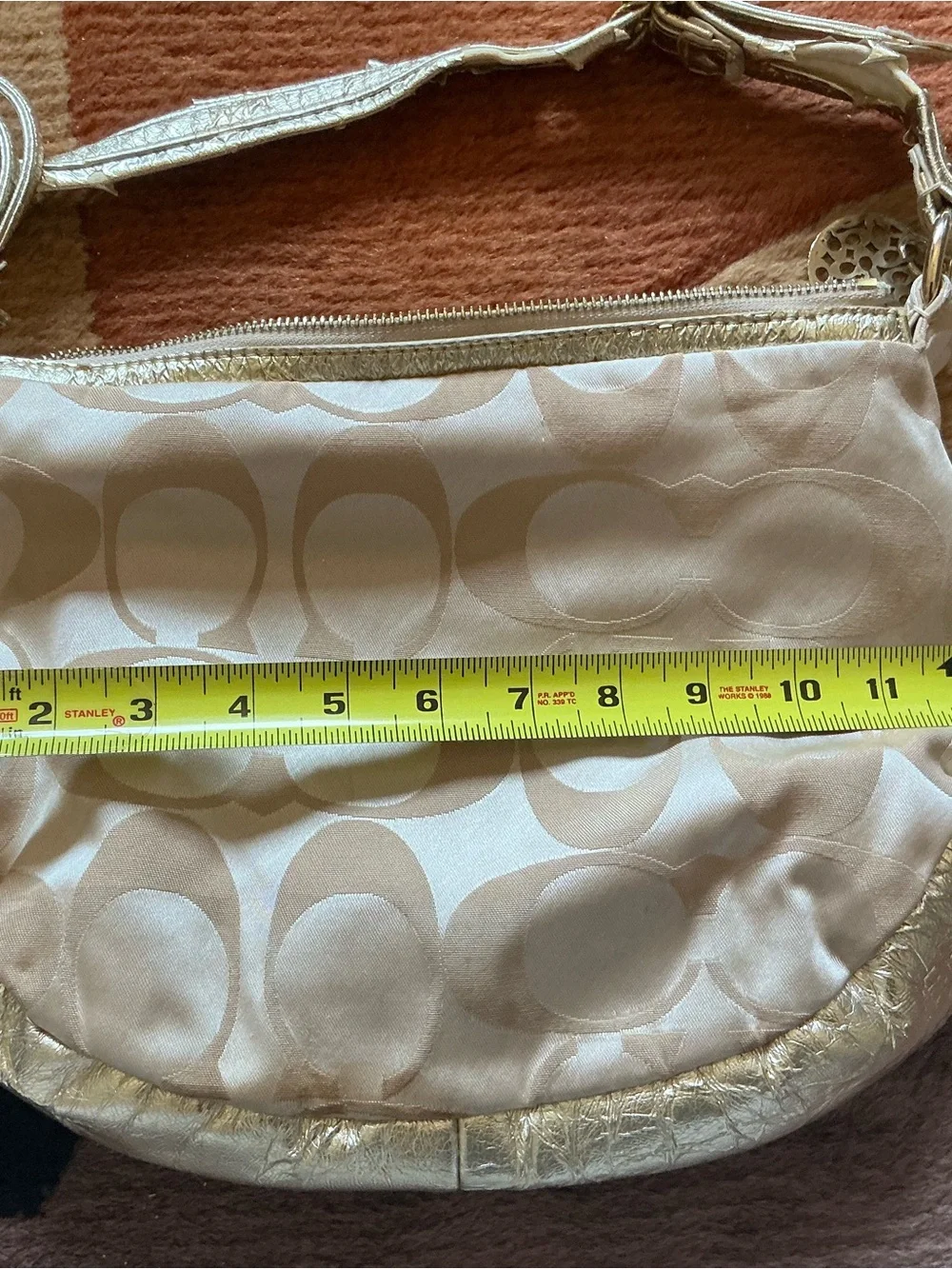 Coach beige logo